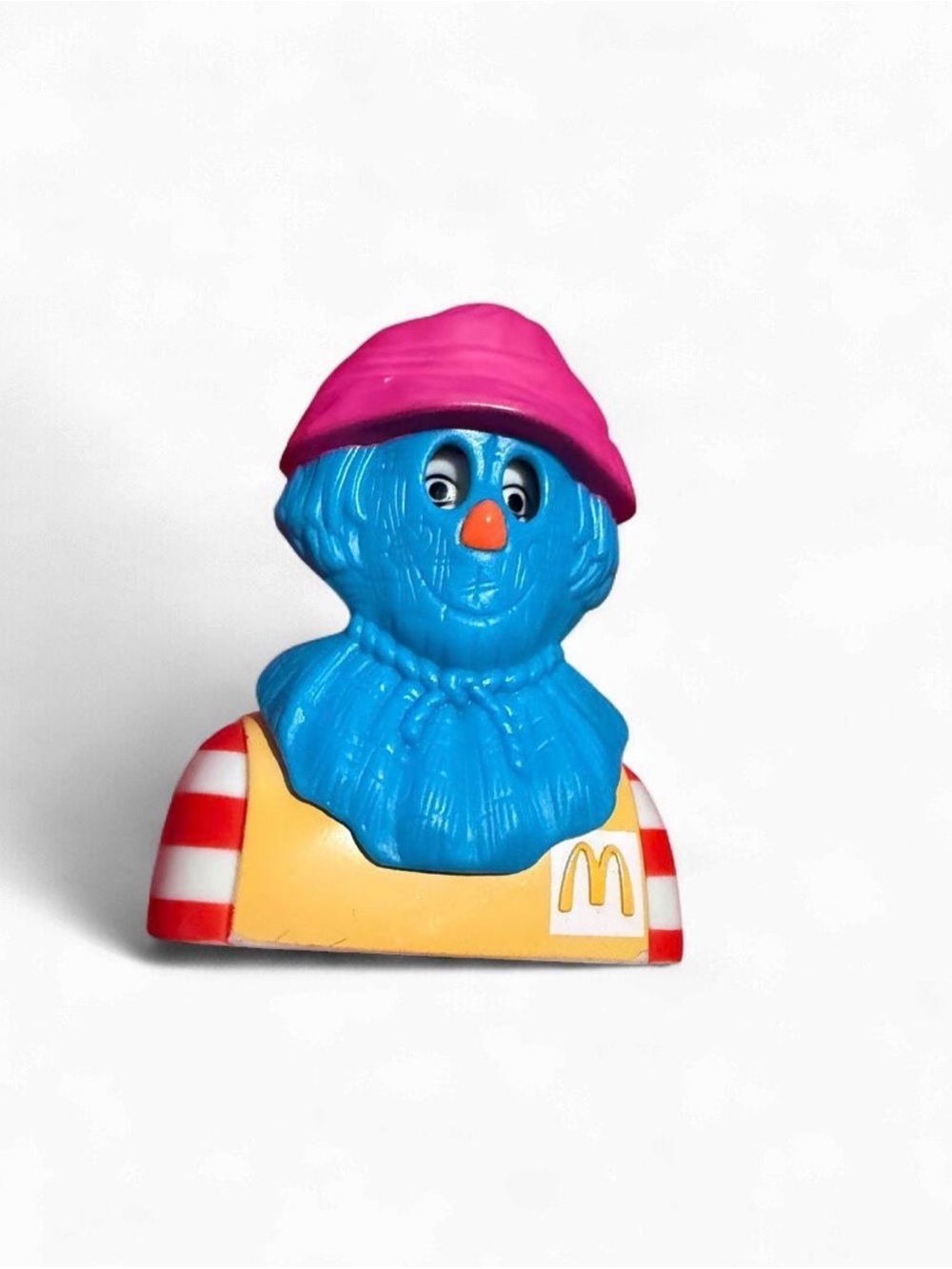 1998 McDonald's Happy Meal toy with blue face, pink hat, and red & white striped